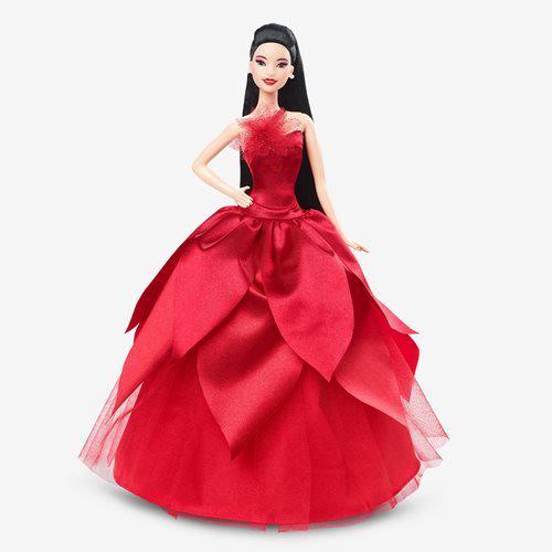 Barbie doll in red gown with long blonde hair