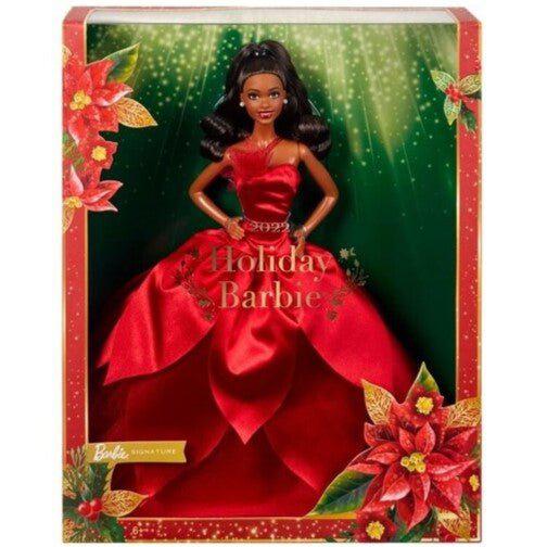 Barbie doll in red gown in holiday-themed box