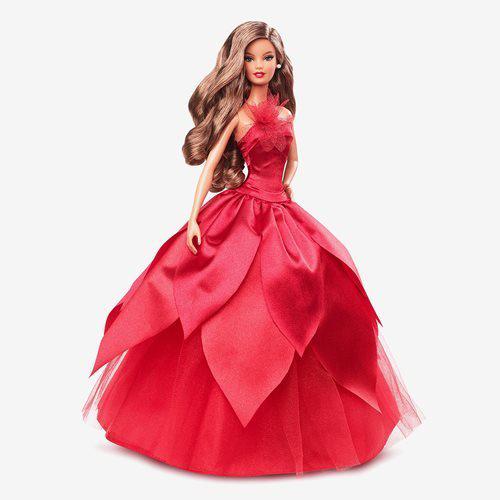 Barbie doll in red gown with long brown hair