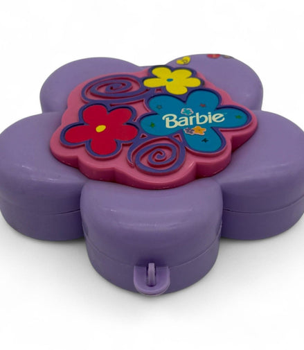 Open Barbie diary showing flower-shaped pages