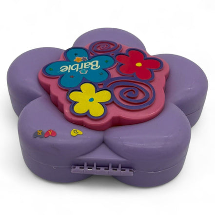 Closed Barbie diary in a purple flower case
