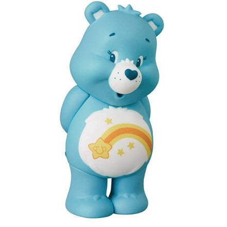 Blue Care Bear figure with star and rainbow belly badge