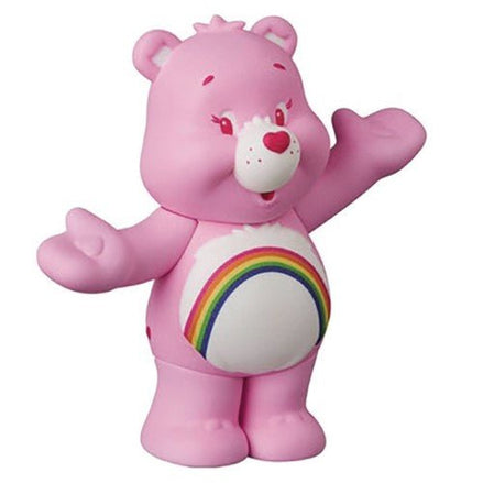 Pink Care Bear figure with rainbow belly badge
