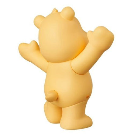Back view of yellow Care Bear figure