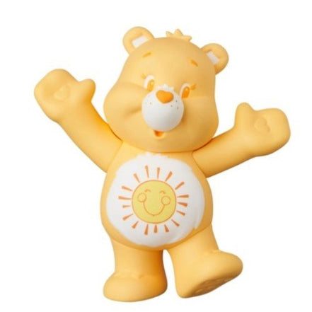 Front view of yellow Care Bear figure