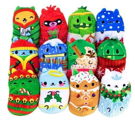 Assortment of Cats vs Pickles Holiday Plushies featuring various festive designs