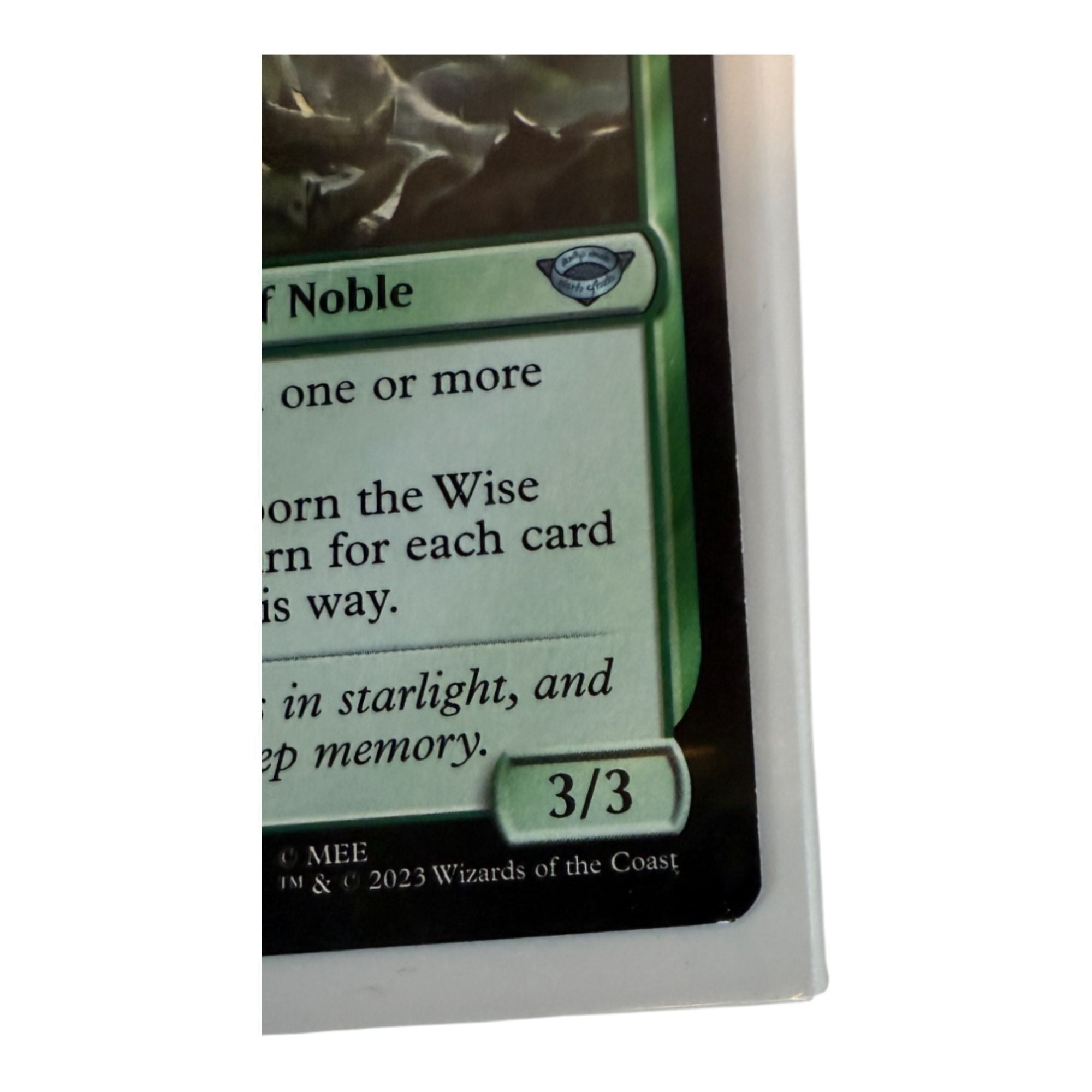 Bottom section of Celebrorn The Wise card displaying power and toughness