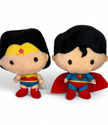 Chibi Wonder Woman and Superman plush dolls standing side by side