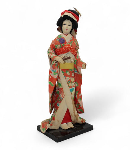 Collectible Japanese Geisha Doll with Kimono and Sword DecorUnknownGeisha Dollartcollectiblecultural1
