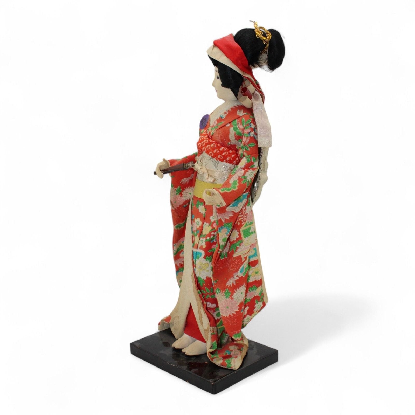 Collectible Japanese Geisha Doll with Kimono and Sword DecorUnknownGeisha Dollartcollectiblecultural3