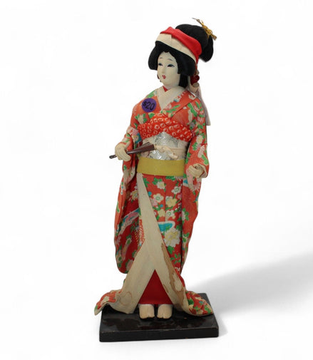 Collectible Japanese Geisha Doll with Kimono and Sword DecorUnknownGeisha Dollartcollectiblecultural2