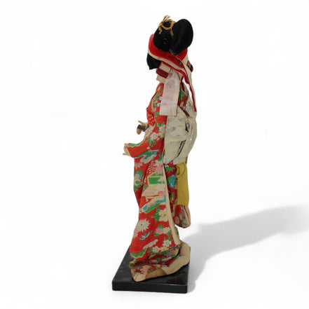 Collectible Japanese Geisha Doll with Kimono and Sword DecorUnknownGeisha Dollartcollectiblecultural4
