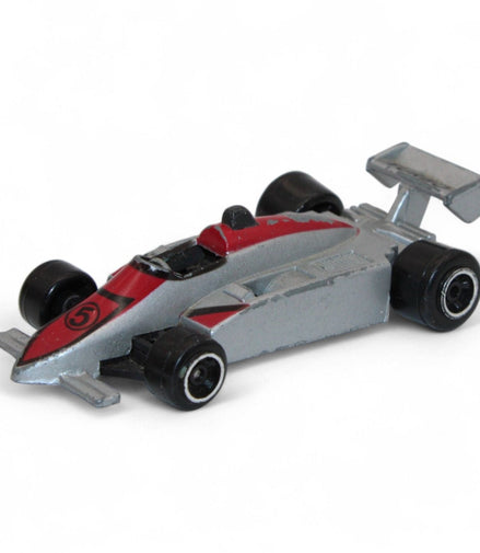 Silver and red die-cast Formula One Indy car with #5 livery