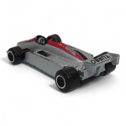 Silver and red die-cast Formula One Indy car with #5 livery