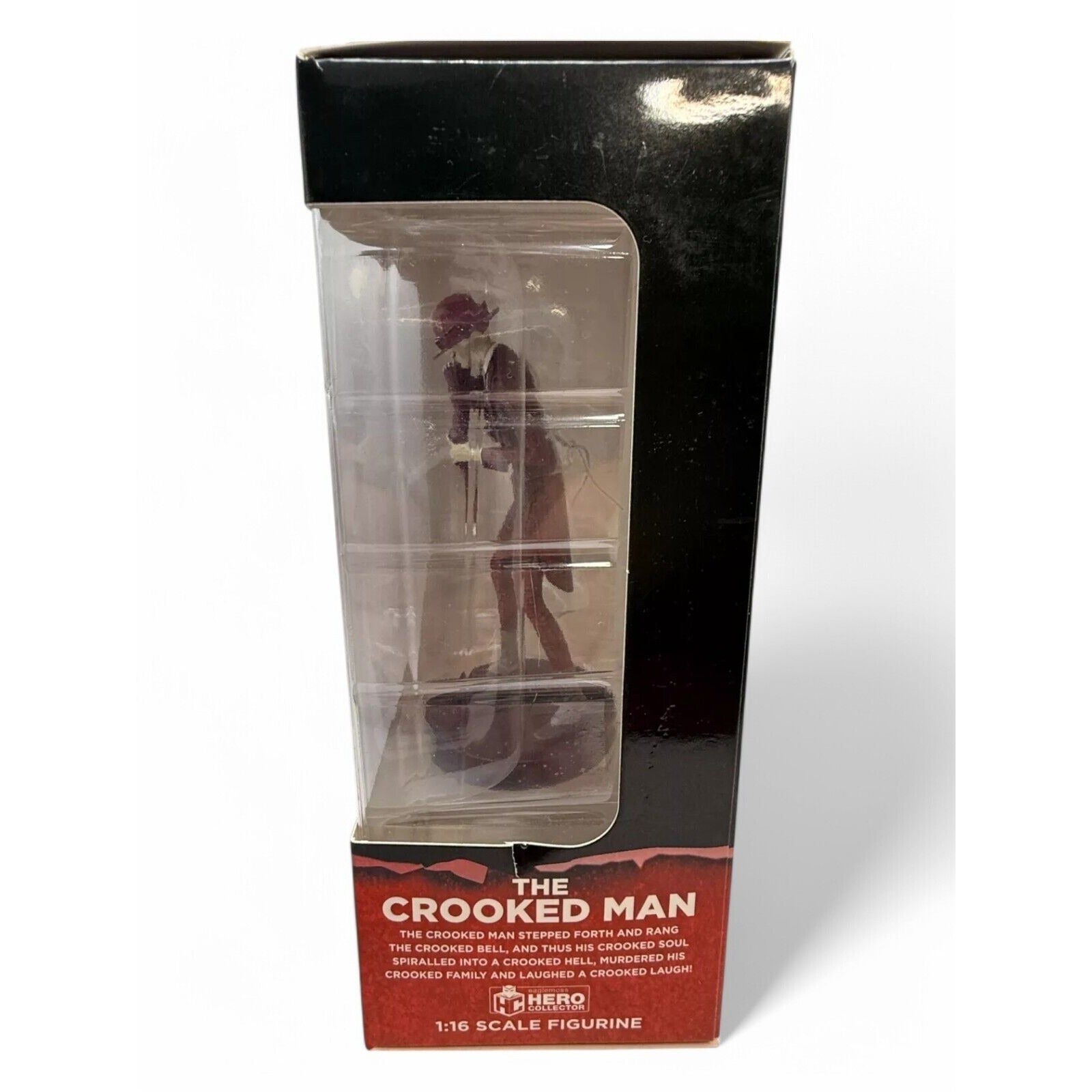Packaged figurine of 'The Crooked Man' with black and red box on a white background