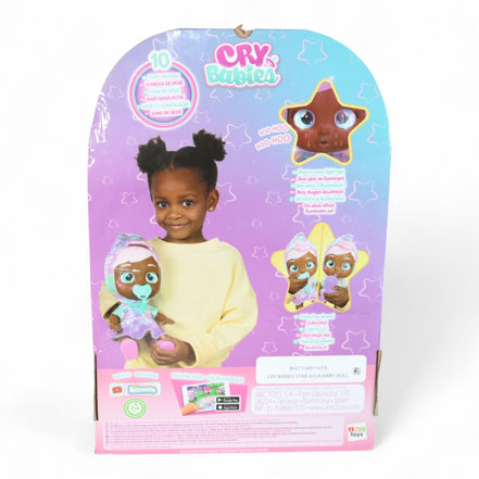 Back of Ayla doll packaging showing features