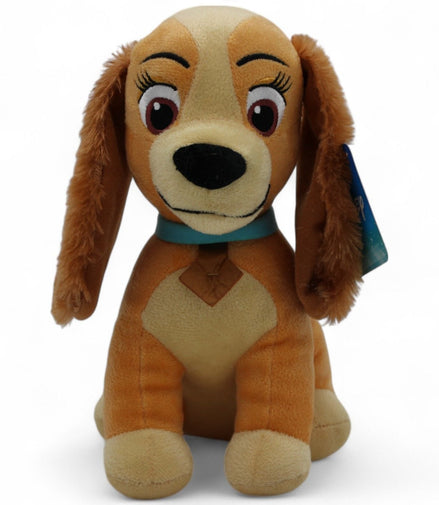 Side view of Disney Lady plush dog with tags