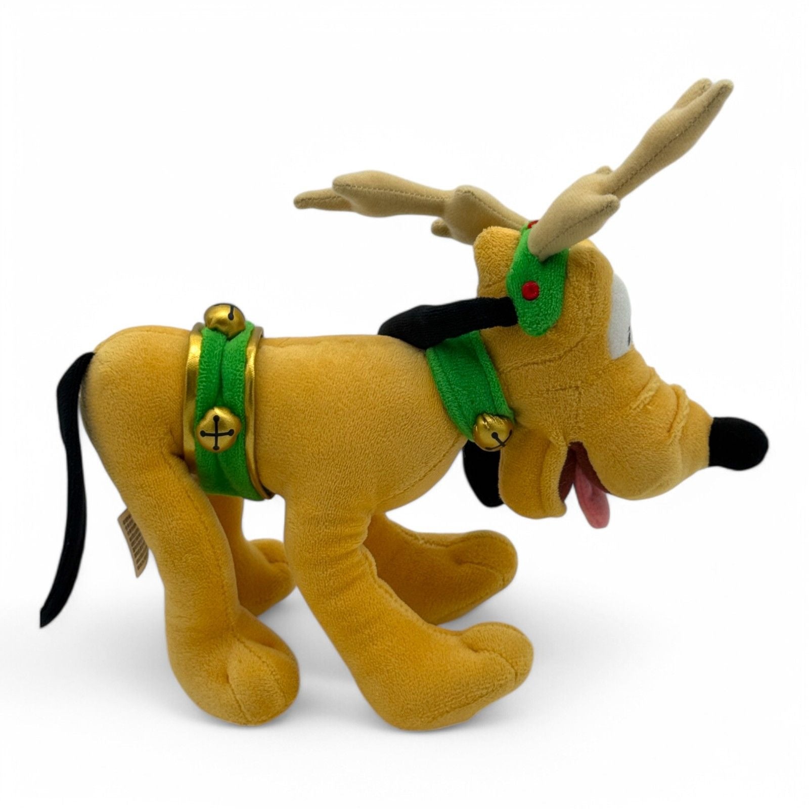 Close-up of Pluto plush face with antlers