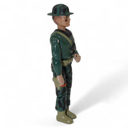 Side view of The Corps Drill Sergeant Whipsaw action figure in green camo