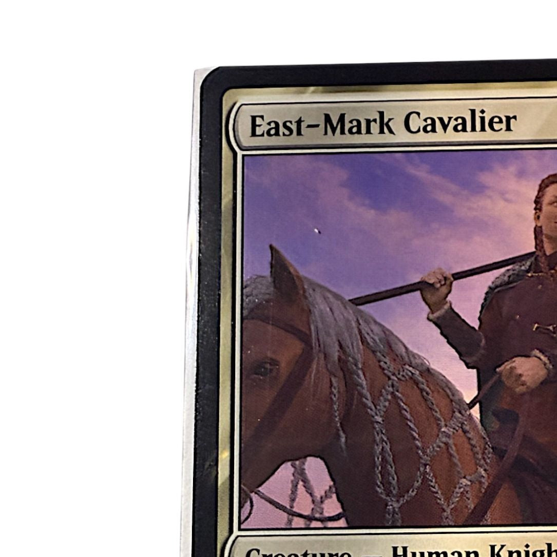 Close-up of East-Mark Cavalier card showing the human knight and vigilance ability