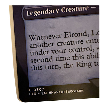 Close-up of Elrond Lord of Rivendell card artist and set details