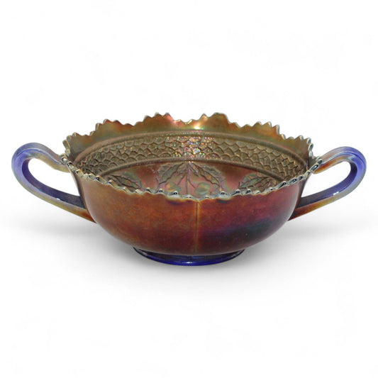 A vintage Fenton Carnival Glass cherry circles bonbon bowl with two handles, scalloped edge, and beautiful iridescent finish, excellent display piece.
