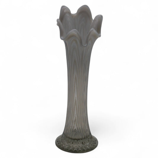 An antique Fenton 11″ white opalescent swirl-patterned carnival glass vase with ruffled edge, dating to early‑mid century and in excellent condition.
