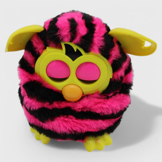 Furby Boom toy with pink and black stripes and yellow ears