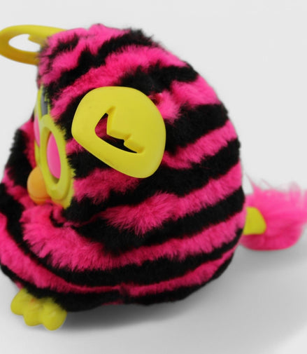 Side view of Furby Boom showing pink and black stripes