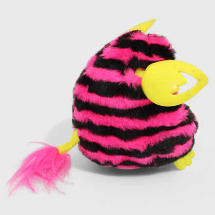 Furby Boom toy with vibrant pink and black stripes