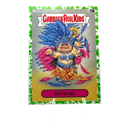 A 2023 Garbage Pail Kids “Rita Rio” sticker card (#71b) from the Go On Vacation series, featuring colorful carnival-themed artwork.
