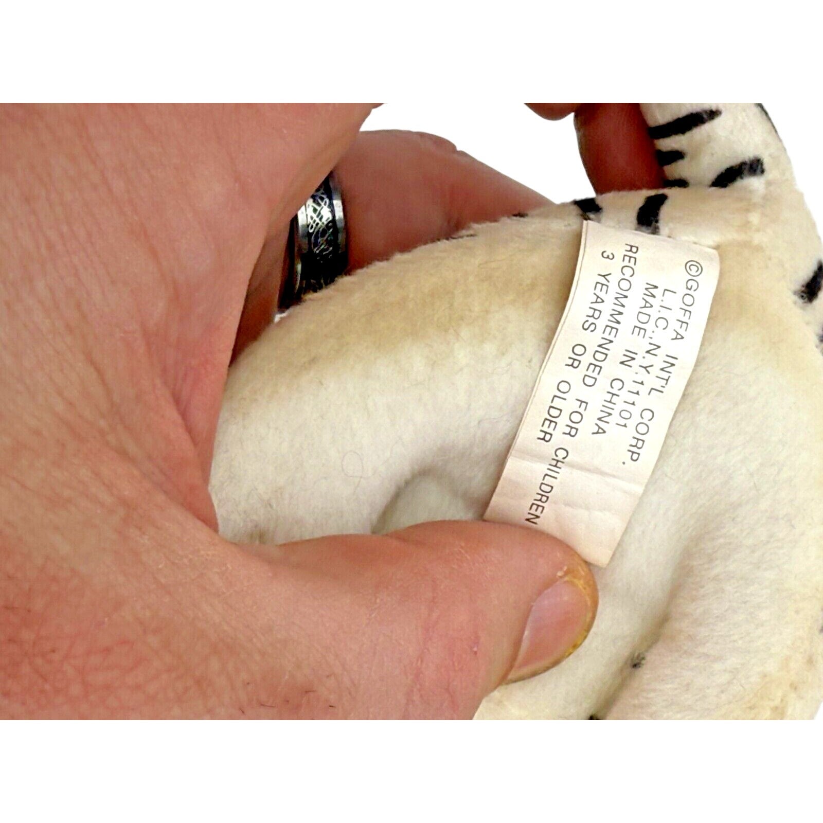 Goffa white tiger plush with product tag visible