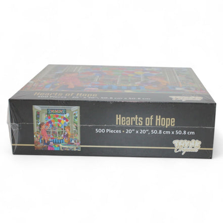 Bottom view of Hearts of Hope puzzle box with product information