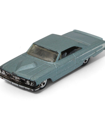 1964 Ford Galaxie 500XL die-cast model in light blue