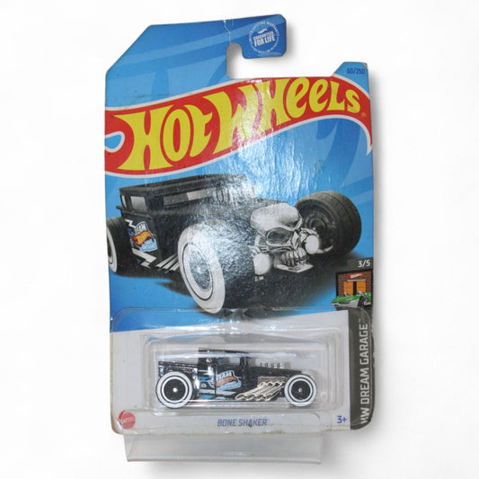 A Hot Wheels Dream Garage “Bone Shaker” 1:64 scale die‑cast car in 60/250 black mainline release, still sealed in its Legends Series packaging.
