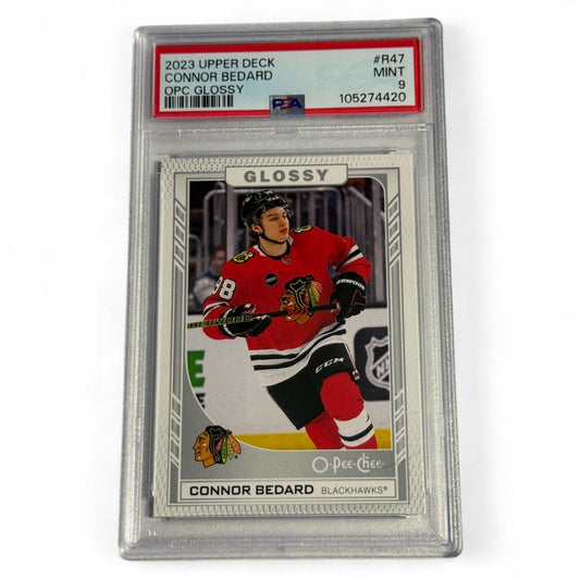 2023 Upper Deck Connor Bedard OPC Glossy Rookie Card R‑47 front view showing Bedard in Chicago Blackhawks uniform
