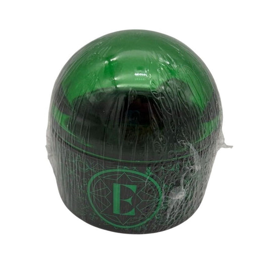 Iridescent green glass bubble inspired by Elphaba, wrapped and sealed.