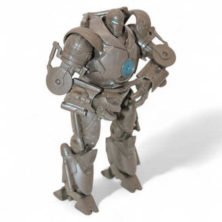Iron Monger action figure with blue chest light and articulated joints