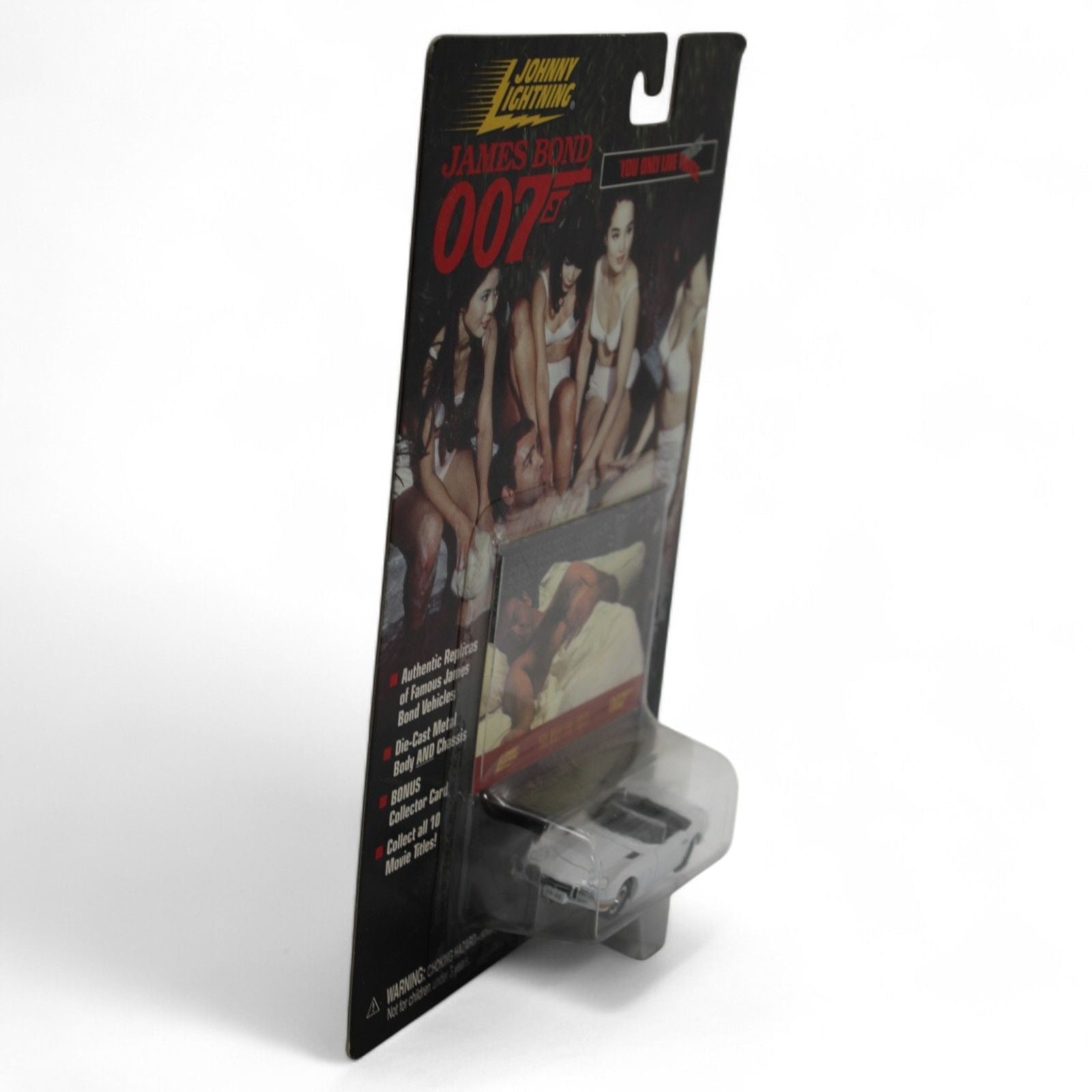 Angled view of Johnny Lightning 007 diecast car packaging