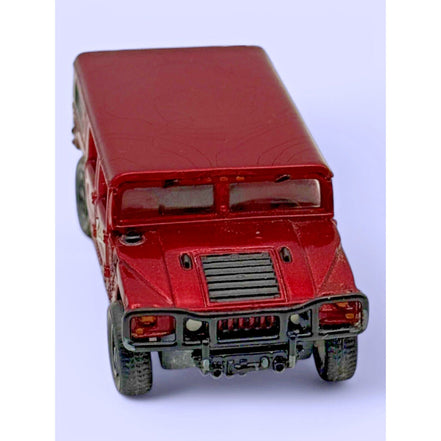 Johnny Lightning 2000 Hummer H1 4-Door SUV diecast model in red, side view
