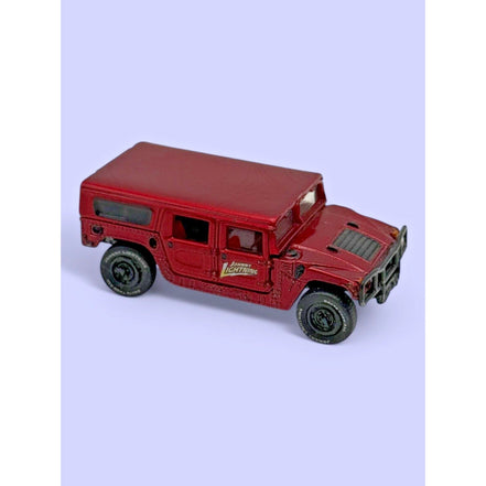 Johnny Lightning 2000 Hummer H1 4-Door SUV diecast model in red, rear view