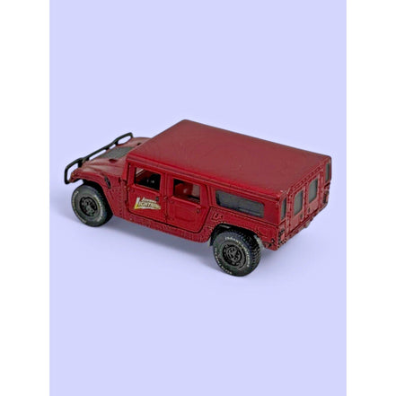 Johnny Lightning 2000 Hummer H1 4-Door SUV diecast model in red, front view
