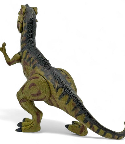 Side view of the Jurassic Park III T-Rex collectible toy