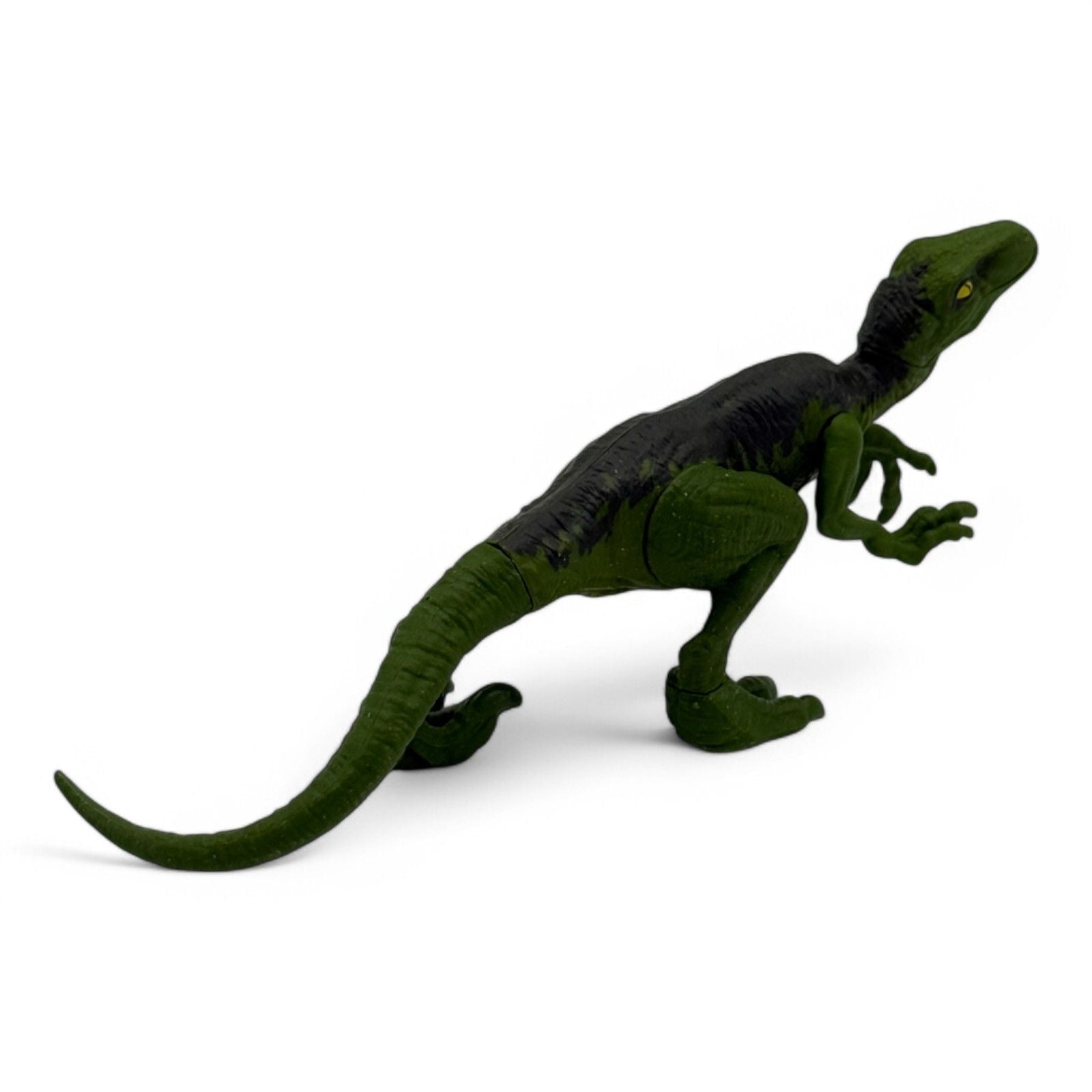 Green Velociraptor action figure with movable limbs from Jurassic World