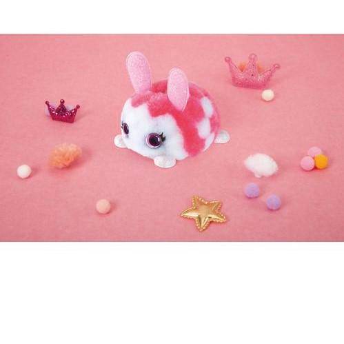 KaPoof Pets Floofy toy surrounded by colorful decorations