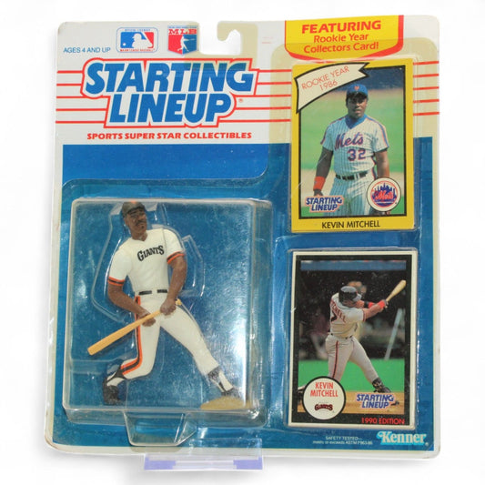 1990 Starting Lineup Kevin Mitchell action figure by Kenner, featuring Giants uniform, collector card, and rookie year Mets card.

