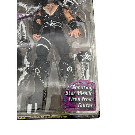 Back of KISS Paul Stanley action figure packaging showing other figures