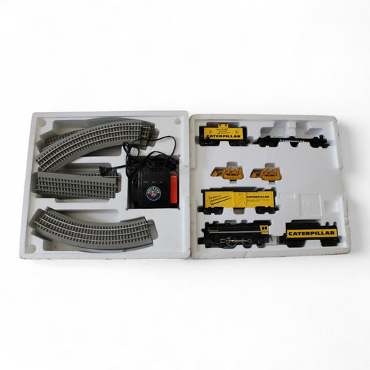 Lionel Caterpillar steam engine train set with tracks and accessories