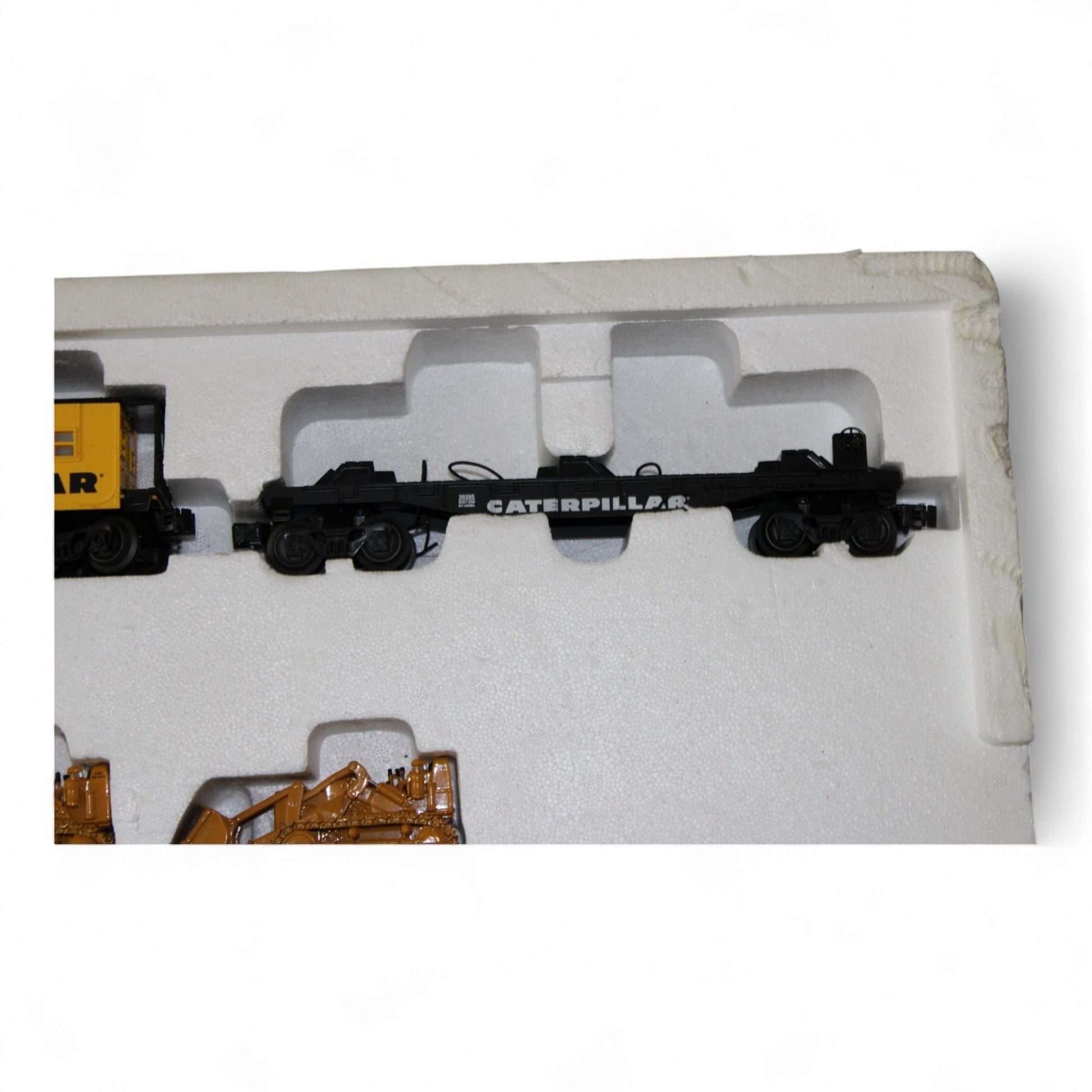 Lionel Caterpillar steam engine train set with tracks and accessories