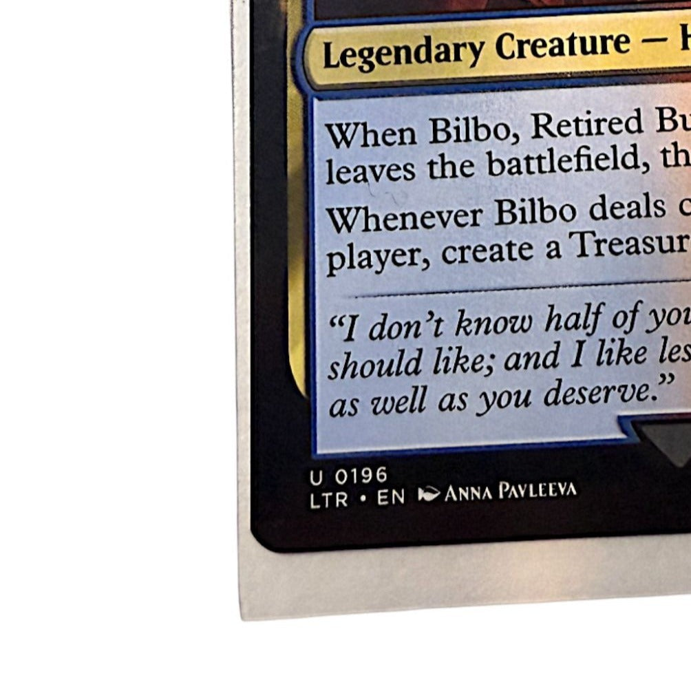 Magic: The Gathering Bilbo Retired Burglar card featuring Bilbo as a Halfling Rogue
